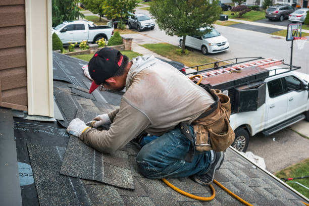 Professional Roofing technician working in East Rochester, NY
